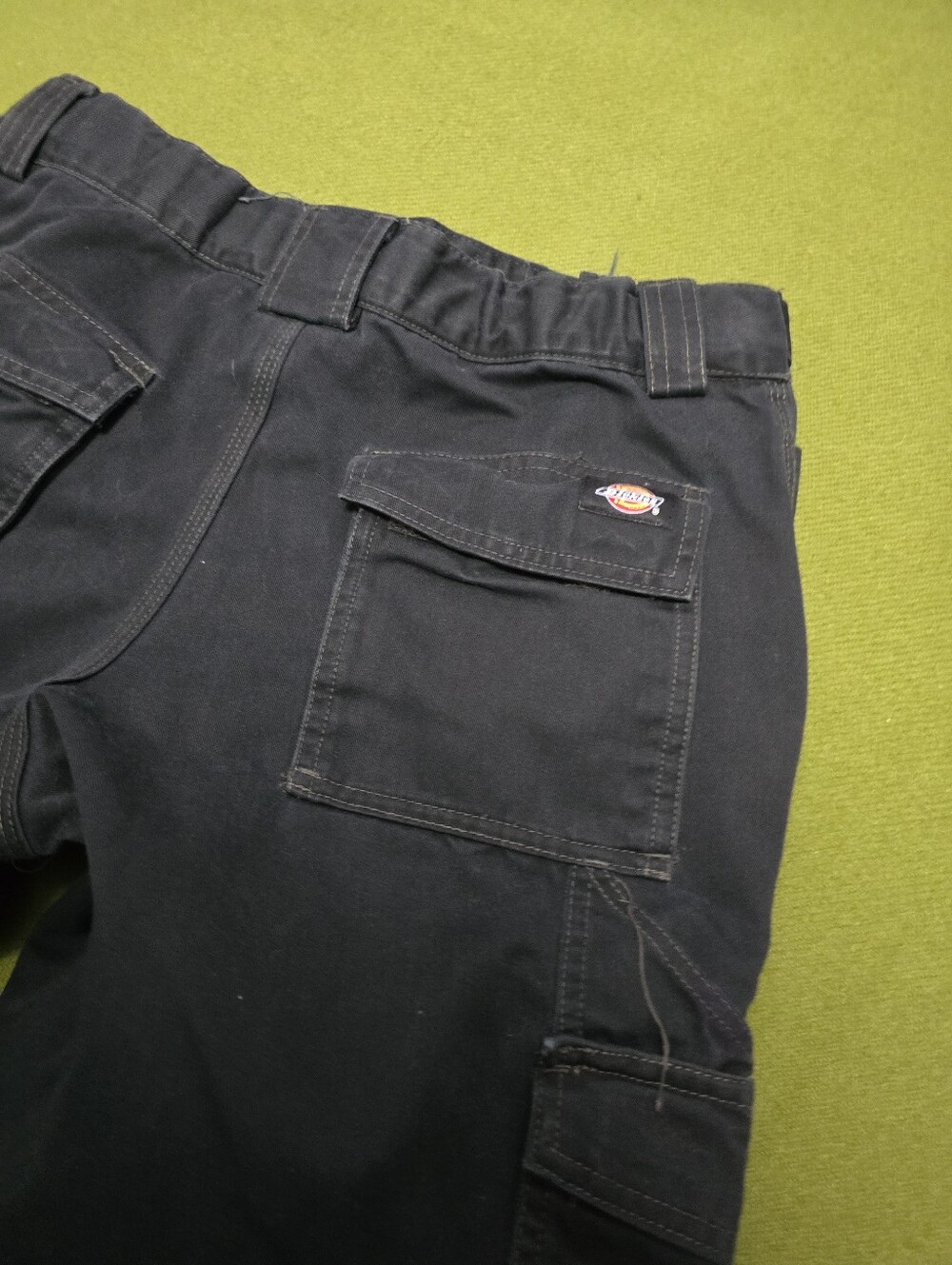 black Dickies cargo work pants featuring double knee